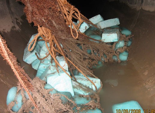 APS Floc Logs secured inside a 66-inch discharge pipe